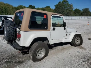 2000 Jeep Wrangler Sahara with VIN 1J4FA59SXYP764539, listed as a Copart auction lot 52707385 with 136,159 mi miles and Salvage title. Bid and sale history available at DreamBid. Image 3.