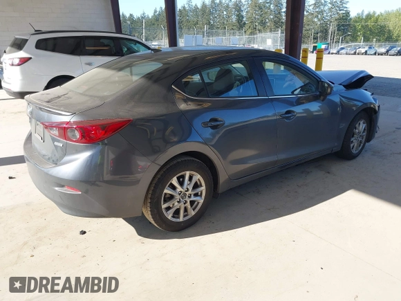 2014 Mazda 3 i Grand Touring with VIN JM1BM1W76E1174860, listed as a IAAI auction lot 42095053 with 44,727 mi miles and . Bid and sale history available at DreamBid. Image 4.
