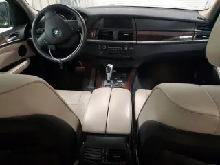 2012 BMW X5 35i с VIN 5UXZV4C55CL750678, выставлен на аукционе Copart как лот 52995185 с пробегом 130 912 миль миль и Чистый • Clean title. История ставок и продаж доступна на DreamBid. Изображение 8.