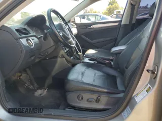 2013 Volkswagen Passat SE with VIN 1VWBP7A34DC042341, listed as a Copart auction lot 66894324 with 200,944 mi miles and Salvage title. Bid and sale history available at DreamBid. Image 7.