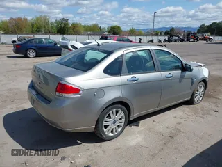 2008 Ford Focus SE z VIN 1FAHP35N78WZ94676, wystawiony jako IAAI lot #42094725 z przebiegiem 106 353 mil mil oraz . Historia ofert i sprzedaży dostępna na DreamBid. Obrazek 4.