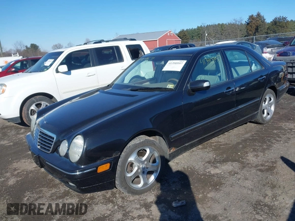 2002 Mercedes-Benz E-Class with VIN WDBJF82JX2X072422, listed as a IAAI auction lot 41390957 with 132,825 mi miles. Bid and sale history available at carsss.com. Image 2.