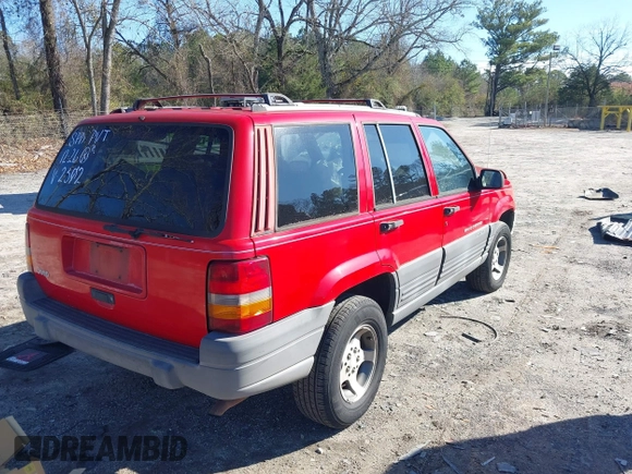 1996 Jeep Grand Cherokee Laredo with VIN 1J4EX58S8TC122302, listed as a IAAI auction lot 41218573 with 195,392 mi miles. Bid and sale history available at carsss.com. Image 4.