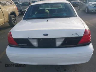 2000 Ford Crown Victoria Police Police Interceptor with VIN 2FAFP71W9YX149303, listed as a IAAI auction lot 41888402 with 148,081 mi miles. Bid and sale history available at carsss.com. Image 16.