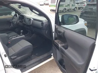 2022 Toyota Tacoma SR with VIN 3TMCZ5AN1NM478457, listed as a IAAI auction lot 42479107 with 59,547 mi miles and . Bid and sale history available at DreamBid. Image 5.
