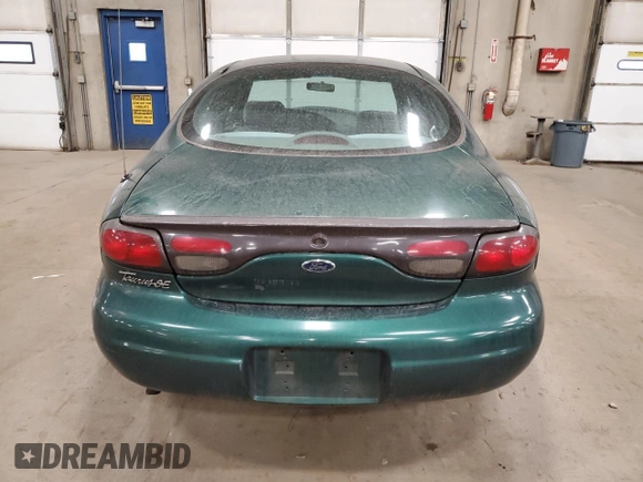 1999 Ford Taurus SE z VIN 1FAFP53U8XA296719, wystawiony jako Copart lot #47874145 z przebiegiem 84 093 mil mil oraz Czysty tytuł • Clean title. Historia ofert i sprzedaży dostępna na DreamBid. Obrazek 6.