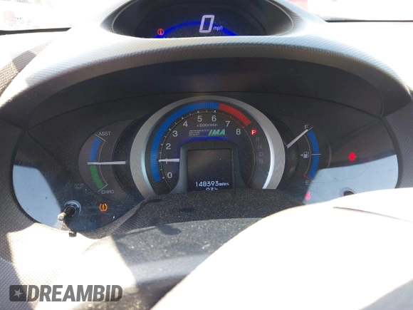 2013 Honda Insight with VIN JHMZE2H31DS002352, listed as a IAAI auction lot 42551515 with 148,393 mi miles and . Bid and sale history available at DreamBid. Image 7.
