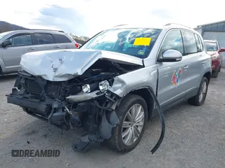 2012 Volkswagen Tiguan SE with VIN WVGAV7AX2CW543003, listed as a IAAI auction lot 41803970 with 187,639 mi miles and . Bid and sale history available at DreamBid. Image 6.