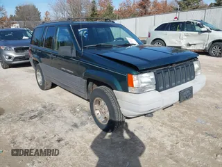 1997 Jeep Grand Cherokee Laredo with VIN 1J4GZ58S2VC595442, listed as a IAAI auction lot 41772133 with 229,764 mi miles. Bid and sale history available at carsss.com. Image 1.