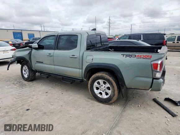 2023 Toyota Tacoma SR with VIN 3TMCZ5AN2PM580515, listed as a Copart auction lot 60422635 with 65,846 mi miles and Salvage title. Bid and sale history available at DreamBid. Image 2.