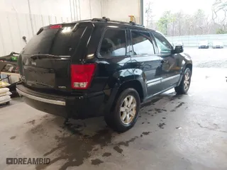2008 Jeep Grand Cherokee Limited with VIN 1J8HR58228C117383, listed as a IAAI auction lot 41983207 with 168,018 mi miles. Bid and sale history available at carsss.com. Image 4.