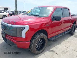 2023 Ford F-150 Lightning Pro with VIN 1FTVW1EL8PWG33656, listed as a IAAI auction lot 42260659 with 22,490 mi miles and . Bid and sale history available at DreamBid. Image 2.