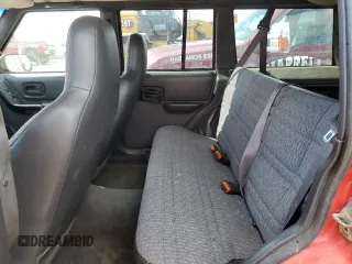 2000 Jeep Cherokee with VIN 1J4FF48S0YL113246, listed as a Copart auction lot 51861455 with 180,965 mi miles and Clean title. Bid and sale history available at DreamBid. Image 10.