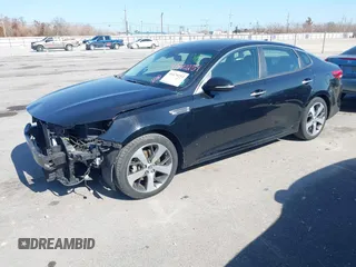 2020 Kia Optima LX with VIN 5XXGT4L34LG448747, listed as a IAAI auction lot 41470254 with 61,657 mi miles. Bid and sale history available at carsss.com. Image 2.