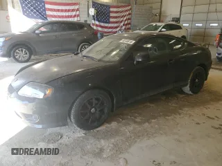 2006 Hyundai Tiburon GT z VIN KMHHN65F06U191744, wystawiony jako Copart lot #46345615 z przebiegiem 150 340 mil mil oraz Szkody całkowita. Historia ofert i sprzedaży dostępna na DreamBid. Obrazek 1.