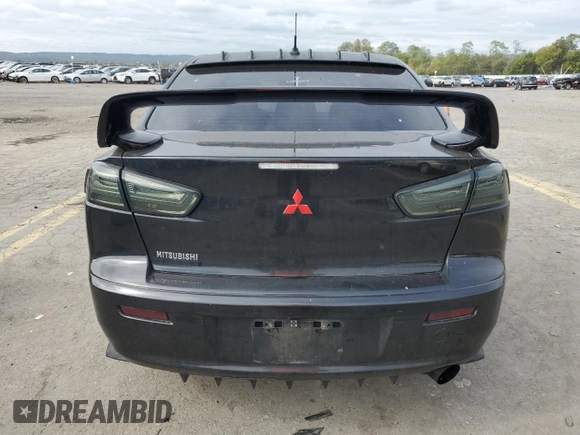 2009 Mitsubishi Lancer ES with VIN JA3AU26U49U002269, listed as a Copart auction lot 73992004 with 144,134 mi miles and Salvage Title. Bid and sale history available at DreamBid. Image 6.