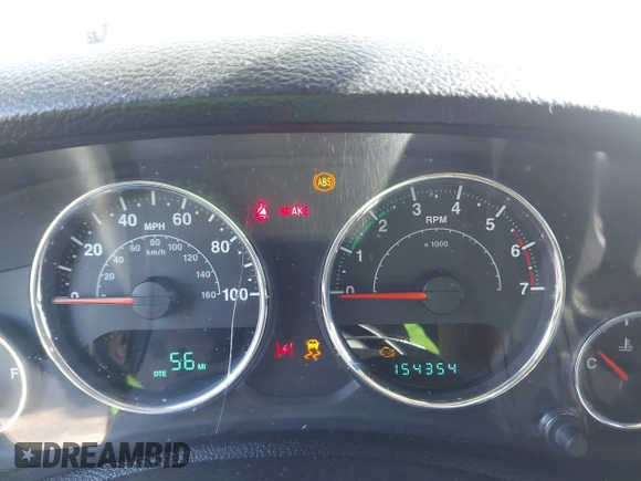 2011 Jeep Wrangler Unlimited Sport with VIN 1J4BA3H18BL598323, listed as a IAAI auction lot 41958043 with 154,354 mi miles. Bid and sale history available at carsss.com. Image 7.