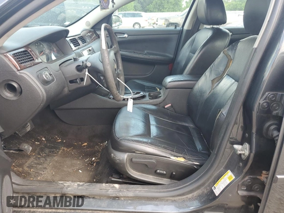 2016 Chevrolet Impala LTZ with VIN 2G1WC5E3XG1103239, listed as a Copart auction lot 61009445 with 203,758 mi miles and Salvage title. Bid and sale history available at DreamBid. Image 7.