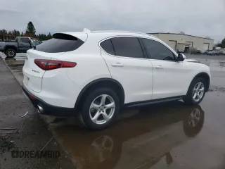 2018 Alfa Romeo Stelvio z VIN ZASFAKAN9J7B88322, wystawiony jako Copart lot #48808605 z przebiegiem 87 096 mil mil oraz Szkody całkowita. Historia ofert i sprzedaży dostępna na DreamBid. Obrazek 3.