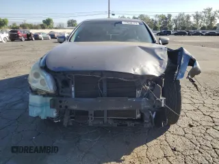 2011 Infiniti G25 Journey with VIN JN1DV6APXBM603831, listed as a Copart auction lot 77838174 with 183,899 mi miles and Salvage Title. Bid and sale history available at carsss.com. Image 5.