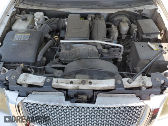 2006 GMC Envoy SLE z VIN 1GKDT13S762345183, wystawiony jako Copart lot #60096645 z przebiegiem 249 658 mil mil oraz Szkoda całkowita • Salvage title. Historia ofert i sprzedaży dostępna na DreamBid. Obrazek 12.