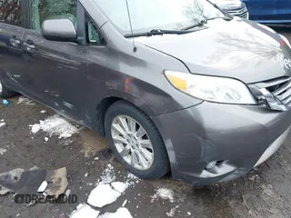 2012 Toyota Sienna XLE with VIN 5TDDK3DC9CS047014, listed as a IAAI auction lot 41551585 with 164,440 mi miles. Bid and sale history available at carsss.com. Image 6.
