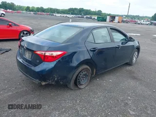 2018 Toyota Corolla L with VIN 2T1BURHEXJC003674, listed as a IAAI auction lot 42511551 with 184,697 mi miles and . Bid and sale history available at DreamBid. Image 4.