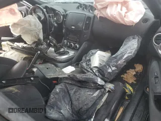 2017 Nissan 370Z z VIN JN1AZ4EH7HM952775, wystawiony jako Copart lot #81940704 z przebiegiem Nie podano mil oraz Szkoda całkowita • Salvage title. Historia ofert i sprzedaży dostępna na DreamBid. Obrazek 8.