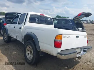 2001 Toyota Tacoma PreRunner z VIN 5TEGN92N11Z805360, wystawiony jako IAAI lot #42128006 z przebiegiem 295 381 mil mil oraz . Historia ofert i sprzedaży dostępna na DreamBid. Obrazek 3.