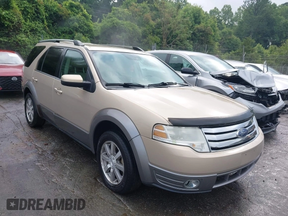 2008 Ford Taurus X SEL z VIN 1FMDK02W98GA29752, wystawiony jako IAAI lot #42485318 z przebiegiem 234 259 mil mil oraz . Historia ofert i sprzedaży dostępna na DreamBid. Obrazek 1.