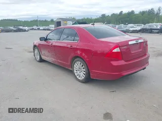 2012 Ford Fusion Hybrid with VIN 3FADP0L38CR218345, listed as a IAAI auction lot 42288247 with 217,118 mi miles and . Bid and sale history available at DreamBid. Image 3.