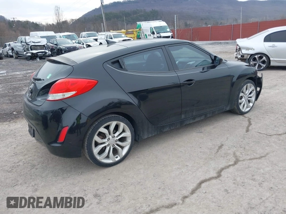 2012 Hyundai Veloster w/Black Int with VIN KMHTC6AD8CU066779, listed as a IAAI auction lot 41699960 with 160,875 mi miles and . Bid and sale history available at DreamBid. Image 4.