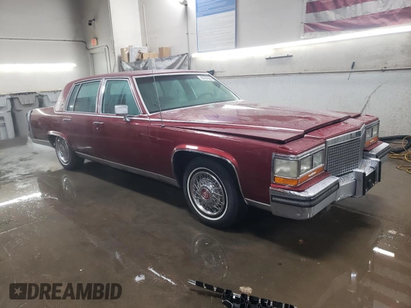 1988 Cadillac Brougham z VIN 1G6DW51Y2JR766782, wystawiony jako Copart lot #83797924 z przebiegiem 63 601 mil mil oraz Szkody całkowita. Historia ofert i sprzedaży dostępna na DreamBid. Obrazek 4.