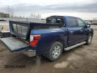 2017 Nissan Titan SV with VIN 1N6AA1EJXHN534790, listed as a Copart auction lot 52567735 with 184,884 mi miles and Salvage Title. Bid and sale history available at DreamBid. Image 3.