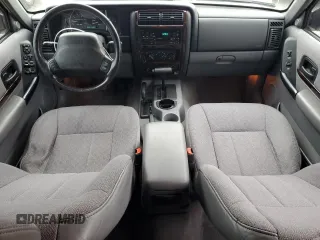 1997 Jeep Cherokee Country with VIN 1J4FJ78S9VL576899, listed as a Copart auction lot 82303584 with 335,746 mi miles and Salvage Title. Bid and sale history available at carsss.com. Image 8.