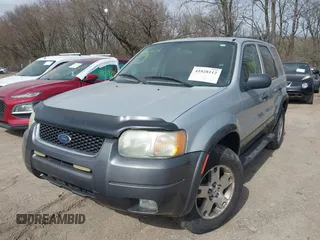 2003 Ford Escape XLT Popular 2 with VIN 1FMYU93163KC74842, listed as a IAAI auction lot 41828112 with 171,988 mi miles. Bid and sale history available at carsss.com. Image 2.