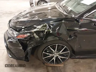 2023 Toyota Camry SE z VIN 4T1G11AK5PU077849, wystawiony jako IAAI lot #42210826 z przebiegiem 45 680 mil mil oraz . Historia ofert i sprzedaży dostępna na DreamBid. Obrazek 6.