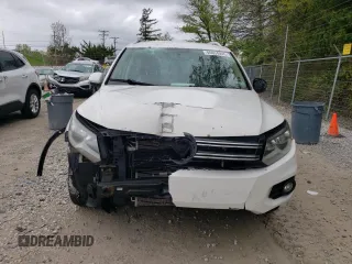 2013 Volkswagen Tiguan SE with VIN WVGAV7AX1DW527053, listed as a Copart auction lot 55934895 with 202,761 mi miles and Clean title. Bid and sale history available at DreamBid. Image 5.