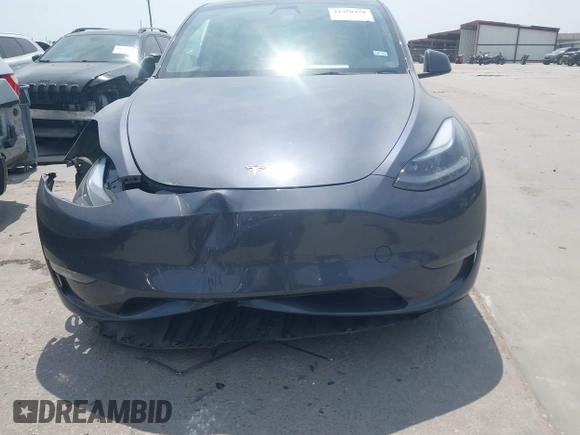 2023 Tesla Model Y Long Range z VIN 7SAYGDEE6PA169168, wystawiony jako IAAI lot #42050428 z przebiegiem 26 731 mil mil oraz . Historia ofert i sprzedaży dostępna na DreamBid. Obrazek 12.