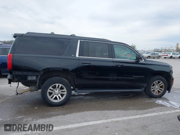 2016 Chevrolet Suburban LT z VIN 1GNSKHKC7GR315884, wystawiony jako IAAI lot #41977108 z przebiegiem 138 902 mil mil oraz . Historia ofert i sprzedaży dostępna na DreamBid. Obrazek 13.