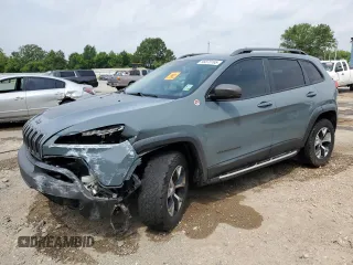 2014 Jeep Cherokee Trailhawk z VIN 1C4PJMBS4EW156550, wystawiony jako Copart lot #56870165 z przebiegiem 100 184 mil mil oraz Szkoda całkowita • Salvage title. Historia ofert i sprzedaży dostępna na DreamBid. Obrazek 1.