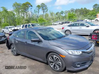 2018 Honda Civic EX-L with VIN JHMFC1F72JX044147, listed as a IAAI auction lot 42012754 with 86,264 mi miles and . Bid and sale history available at DreamBid. Image 1.