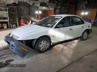 1999 Saturn SL with VIN 1G8ZH528XXZ235067, listed as a Copart auction lot 74508564 with 155,180 mi miles and Salvage Title. Bid and sale history available at carsss.com. Image 1.