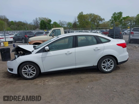 2016 Ford Focus SE with VIN 1FADP3F21GL403121, listed as a IAAI auction lot 42130743 with 103,592 mi miles and . Bid and sale history available at DreamBid. Image 14.