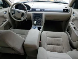 2005 Ford Five Hundred SE z VIN 1FAFP23155G171840, wystawiony jako Copart lot #54190685 z przebiegiem 147 383 mil mil oraz Szkoda całkowita • Salvage title. Historia ofert i sprzedaży dostępna na DreamBid. Obrazek 8.