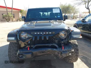 2020 Jeep Gladiator Rubicon z VIN 1C6JJTBG0LL117908, wystawiony jako IAAI lot #41621920 z przebiegiem 61 233 mil mil oraz . Historia ofert i sprzedaży dostępna na DreamBid. Obrazek 12.
