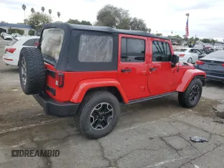 2014 Jeep Wrangler Unlimited Rubicon with VIN 1C4BJWFG1EL232836, listed as a Copart auction lot 82529654 with 106,193 mi miles and Clean Title. Bid and sale history available at carsss.com. Image 3.