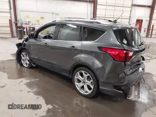 2019 Ford Escape Titanium with VIN 1FMCU9J91KUB11957, listed as a IAAI auction lot 41928264 with 72,460 mi miles. Bid and sale history available at carsss.com. Image 3.