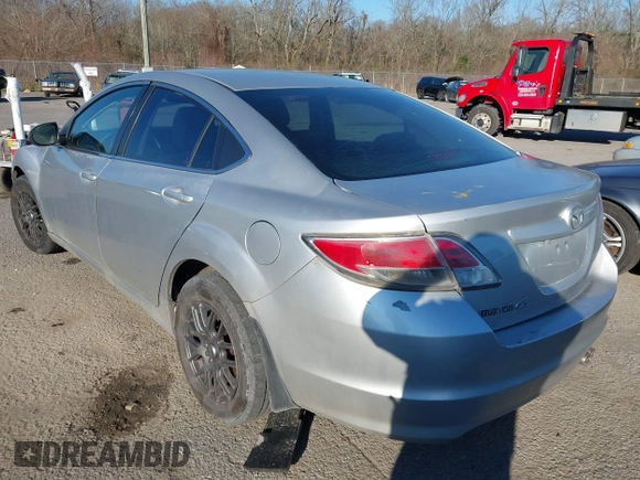 2012 Mazda 6 i Sport with VIN 1YVHZ8BH6C5M26710, listed as a IAAI auction lot 41593399 with 198,857 mi miles and . Bid and sale history available at DreamBid. Image 3.