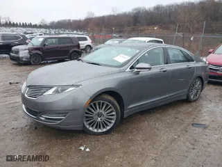 2014 Lincoln MKZ with VIN 3LN6L2GK2ER801312, listed as a IAAI auction lot 41209977 with 152,577 mi miles. Bid and sale history available at carsss.com. Image 2.